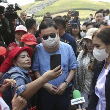 Former Thai PM Thaksin Formally Charged With Royal Defamation