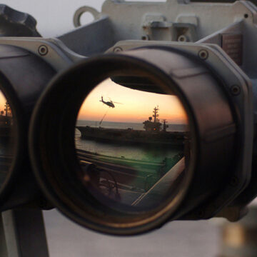 cc U.S. Navy photo by Airman Ricardo J. Reyes ; 051104-N-2984R-004 Onboard USS Harry S. Truman The sun sets over a set of 