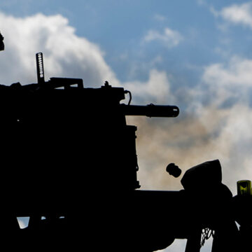 A British soldier fires a 40mm grenade machine gun at the Bemowo Piskie Training Area, Bemowo Piskie, in Poland, on June 8, 2017. Saber Strike 17 is a U.S. Army Europe-led multinational combined forces exercise conducted annually to enhance the NATO alliance throughout the Baltic region and Poland. This year