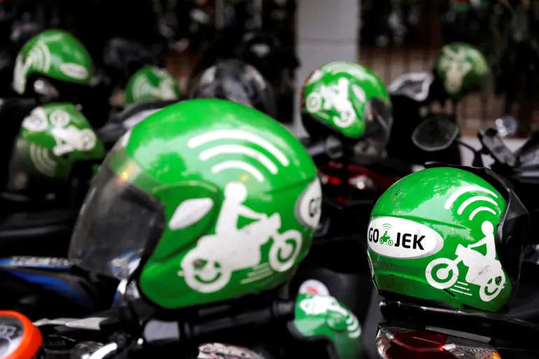 Förare bär Gojek-hjälmar under Go-Food-festivalen i Jakarta, Indonesien, den 27 oktober 2018